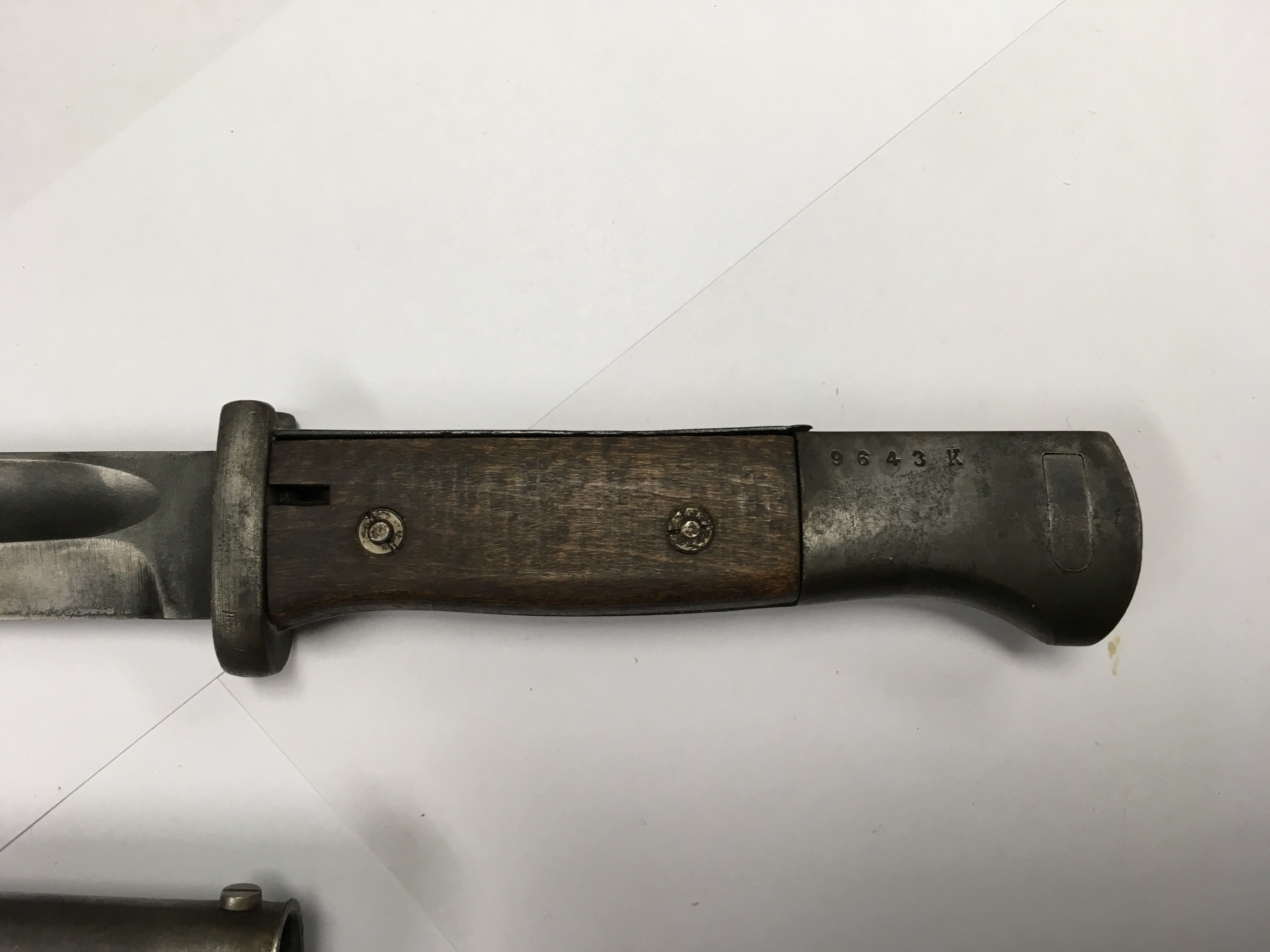 A German M1884 third pattern bayonet with wooden grips and the correct metal sheath and frog. - Image 2 of 3
