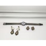 A lady's cocktail watch and two pairs of earrings