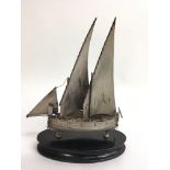 A Chinese silver model of a sailing junk.Approx 24cm