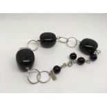 A black agate and silver (925) bracelet. Promise.
