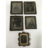 Five framed Victorian daguerreotypes.