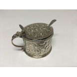A Georgian Silver condiment the hinged lid enclosing a glass liner London hallmarks 1805 with latter