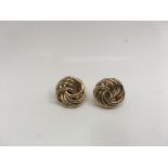A pair of 9ct gold knot earrings. Weight approx 3.35g