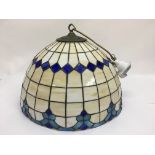 A Tiffany style lamp shade.