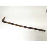 An old native carved walking stick