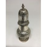 A white metal sugar-caster of Queen Anne style 15 cm heigh 223 grams