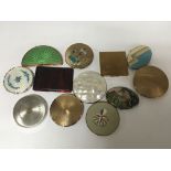 A collection of Vintage lady’s compacts with enamel decoration verious makers including Elgin Tap