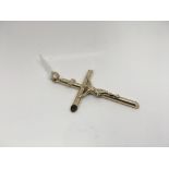 A large 9ct gold crucifix. Weight approx 4.23g