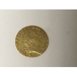 A Georgian gold guinea dated 1788