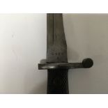 An M1941 Spanish Bolo bayonet, marked "Toledo" to one side of the blade and numbered "5909" on the