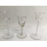 Three 19th century air twist wine stem glasses including a pair