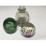 An Early 20th century Millefiori paperweight a conforming Desk Bottle paperweight and and a green