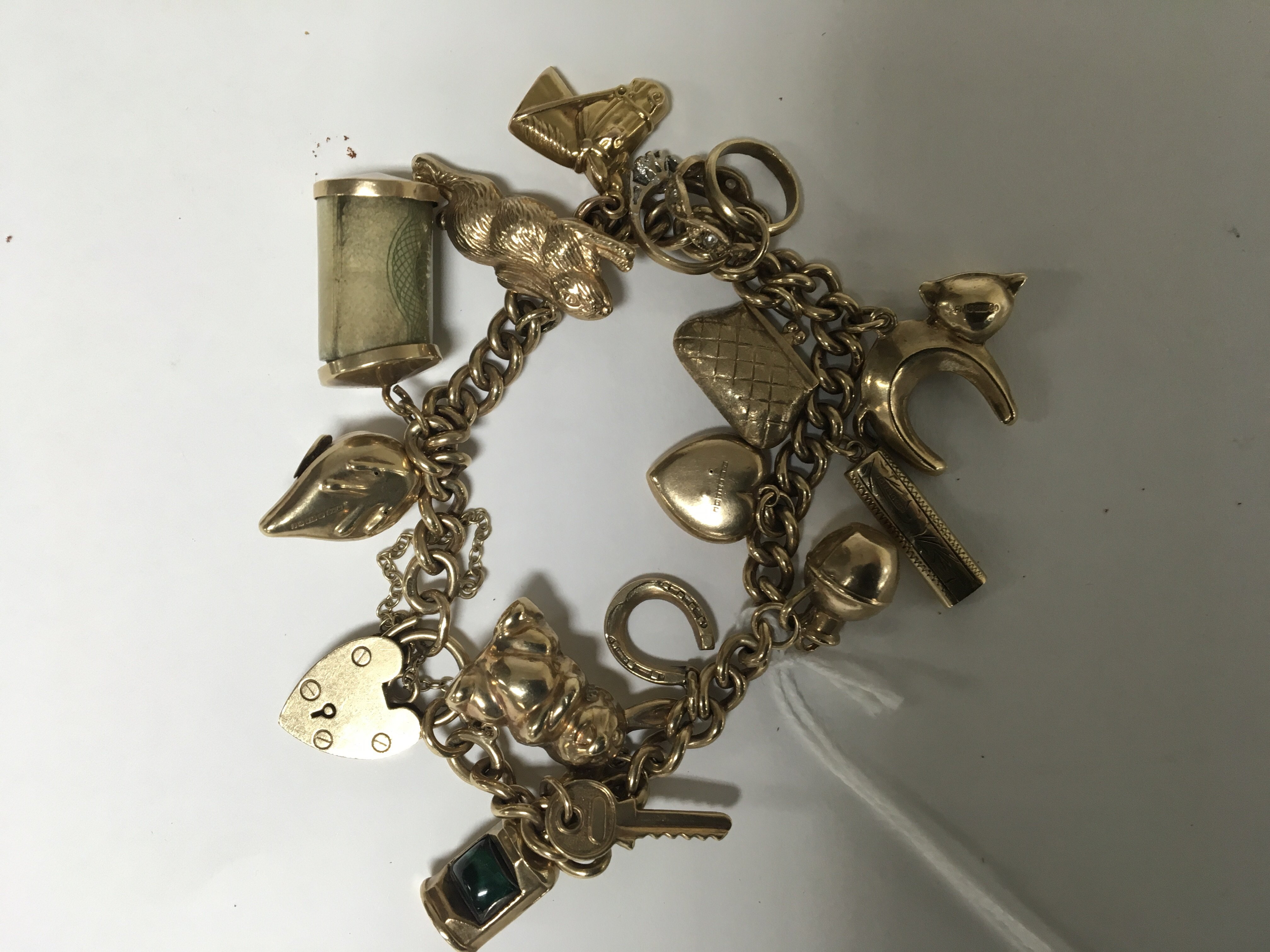 A 9ct gold charm bracelet 39 grams approx