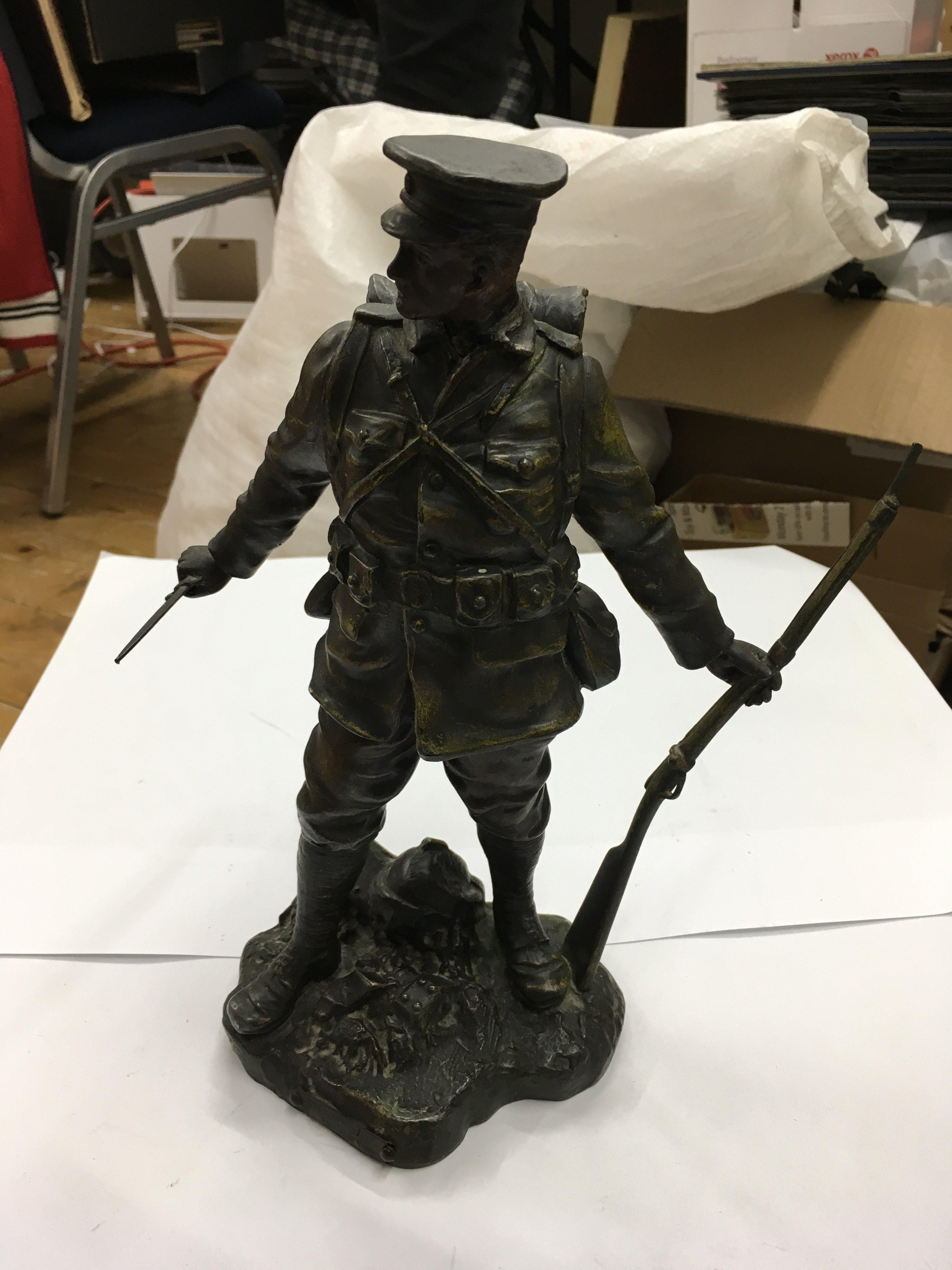 A shelter figure of a First World War soldier. Height approx 27cm.