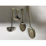 A Georgian Silver tea caddie spoon one other Georgian spoonand two silver preserve spoon