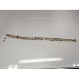 A 9ct gold 'I-Love-You' bracelet. Weight approx 8.69g