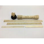 A late 19th Century Japanese ivory jostick holder with pierced and carved decoration on a hardwood
