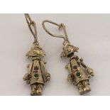 A pair of 9ct Gold earrings in the form of clown figures set with ruby and emerald stones, weight
