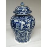 A large Chinese Export blue and white vase and cov