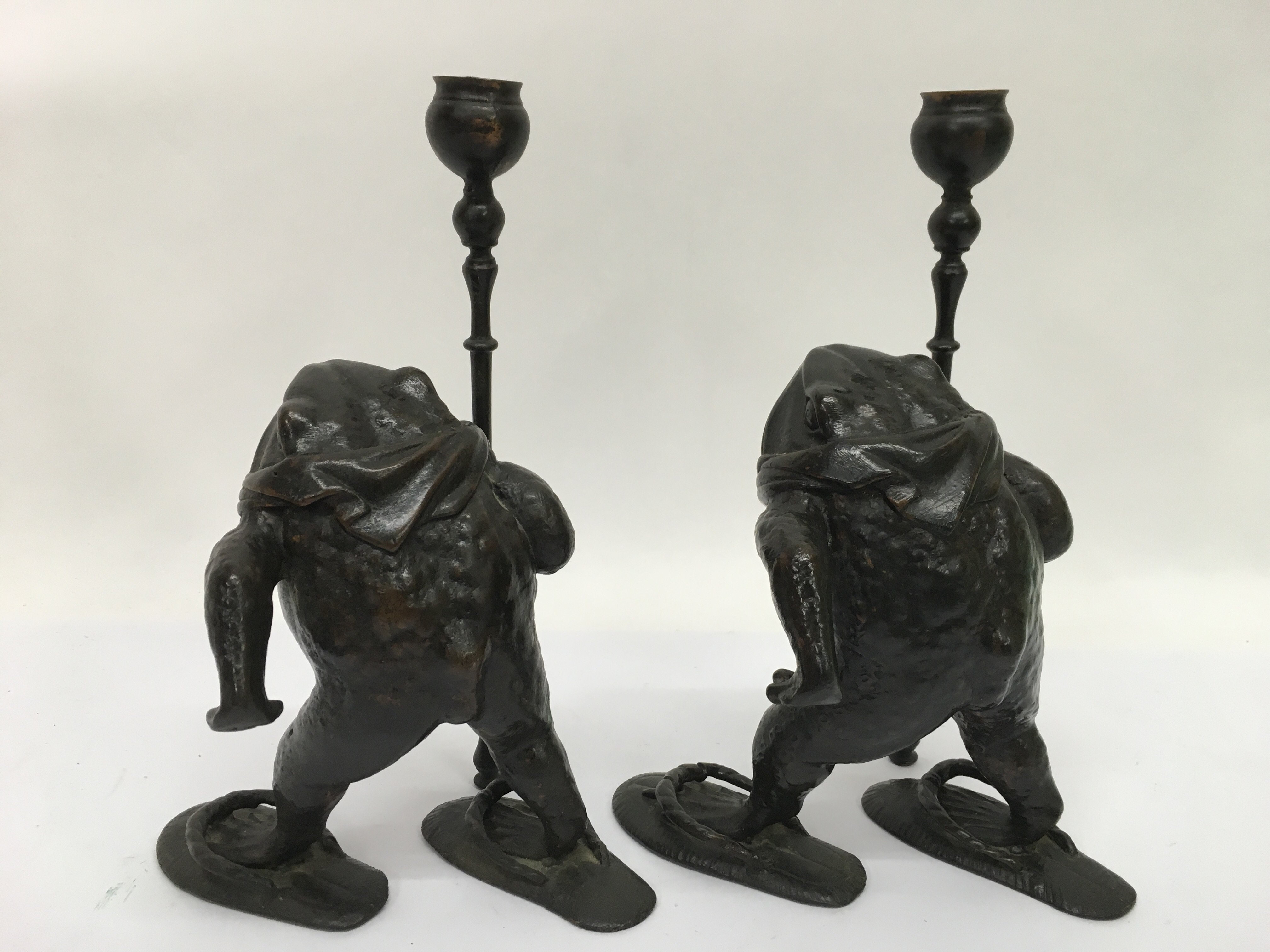 A pair of bronze candlesticks in the form of anthr - Image 3 of 3