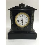 A Benetfink & Co. Ltd London slate mantel clock with key and pendulum.