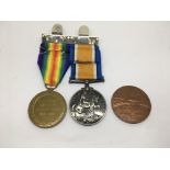 Two WW1 British war medals plus a 1914 medallion c