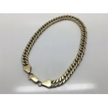 A 9ct Gold slab link bracelet. Weight 20g approxim