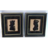 Two framed painted glass silhouettes, initialled C.G.N.Approximately 13.5x16cm