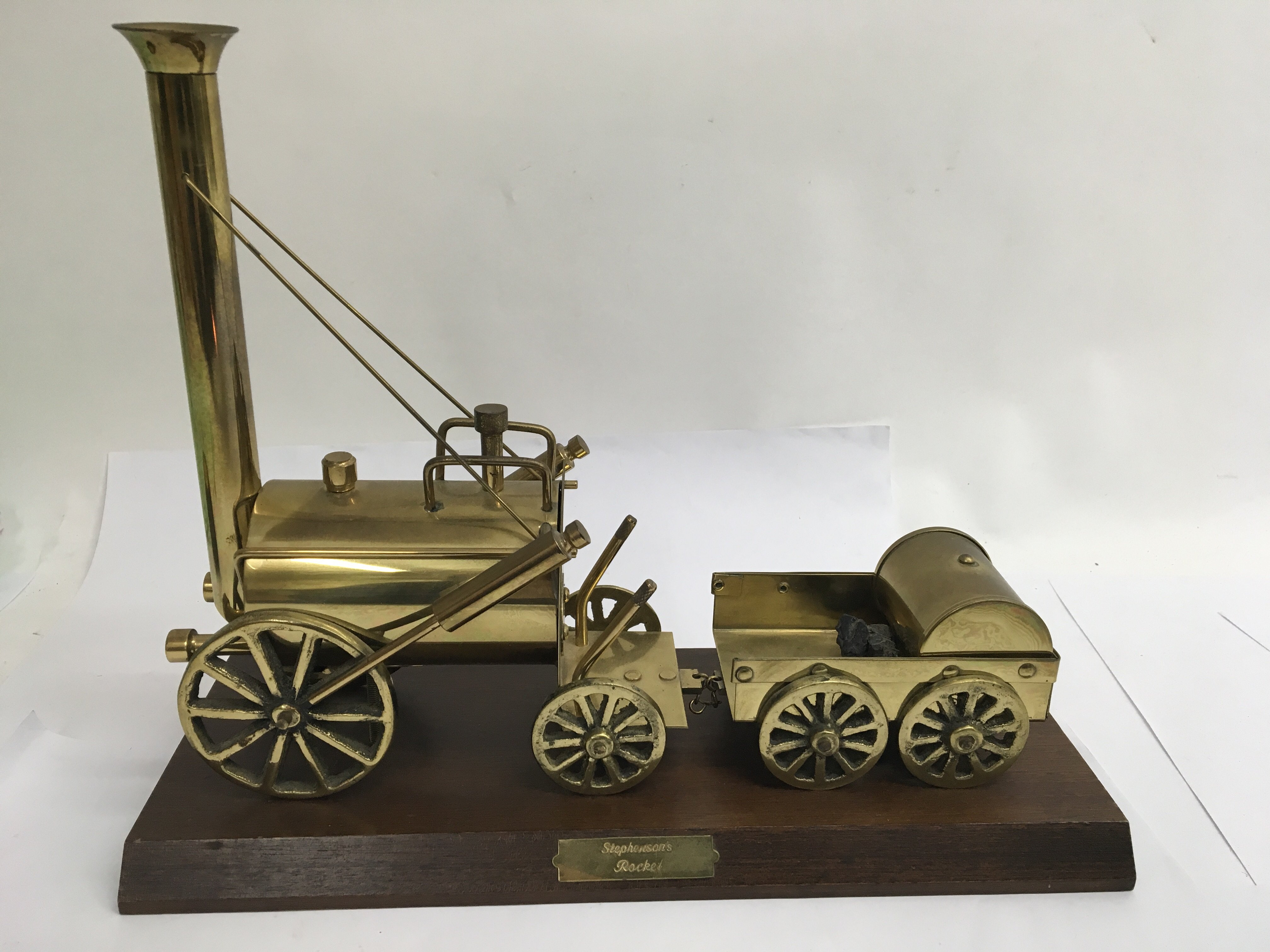 A brass model of Stephenson's rocket engine.Approx 33cm