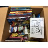 A box of children's books including ladybird & Beatrix Potter.