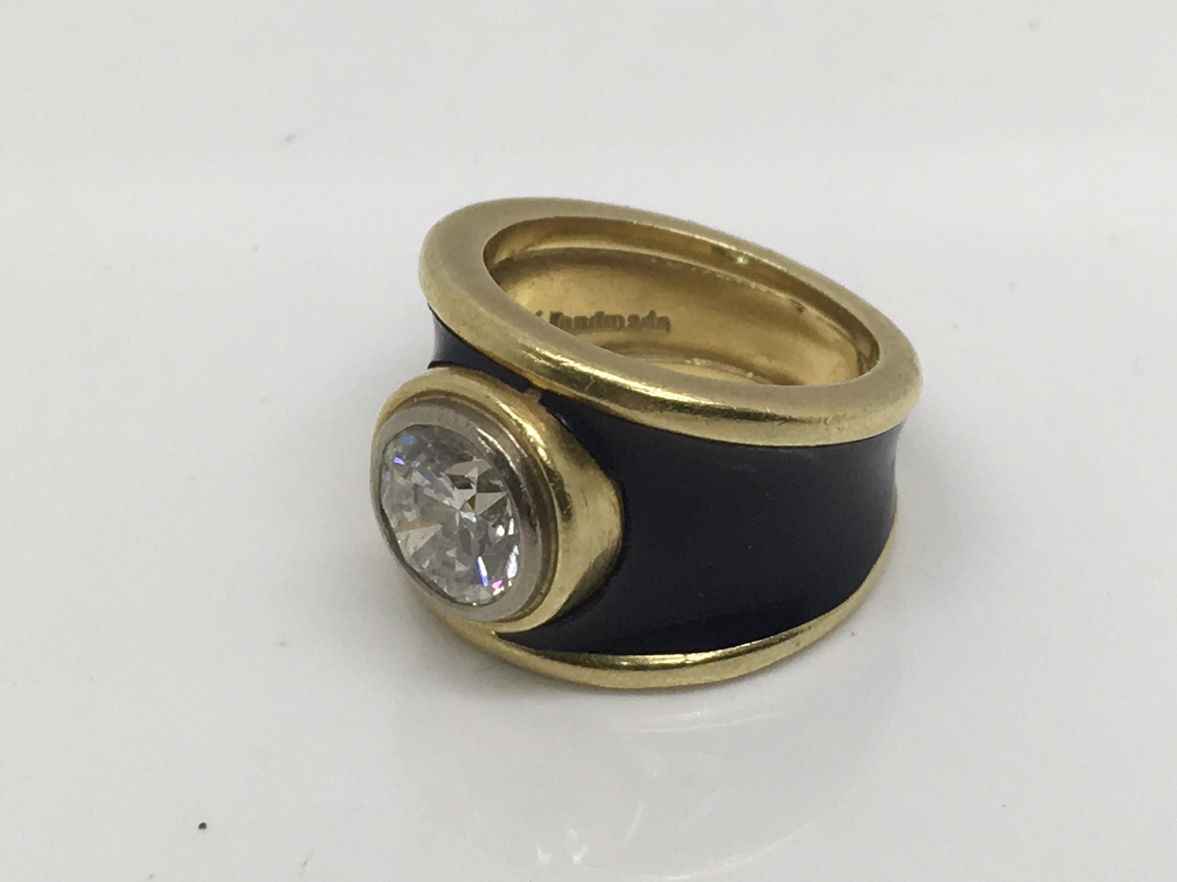 An 18ct gold solitaire diamond ring, approx carat weight 2ct, approx size K and weight 14.2g.