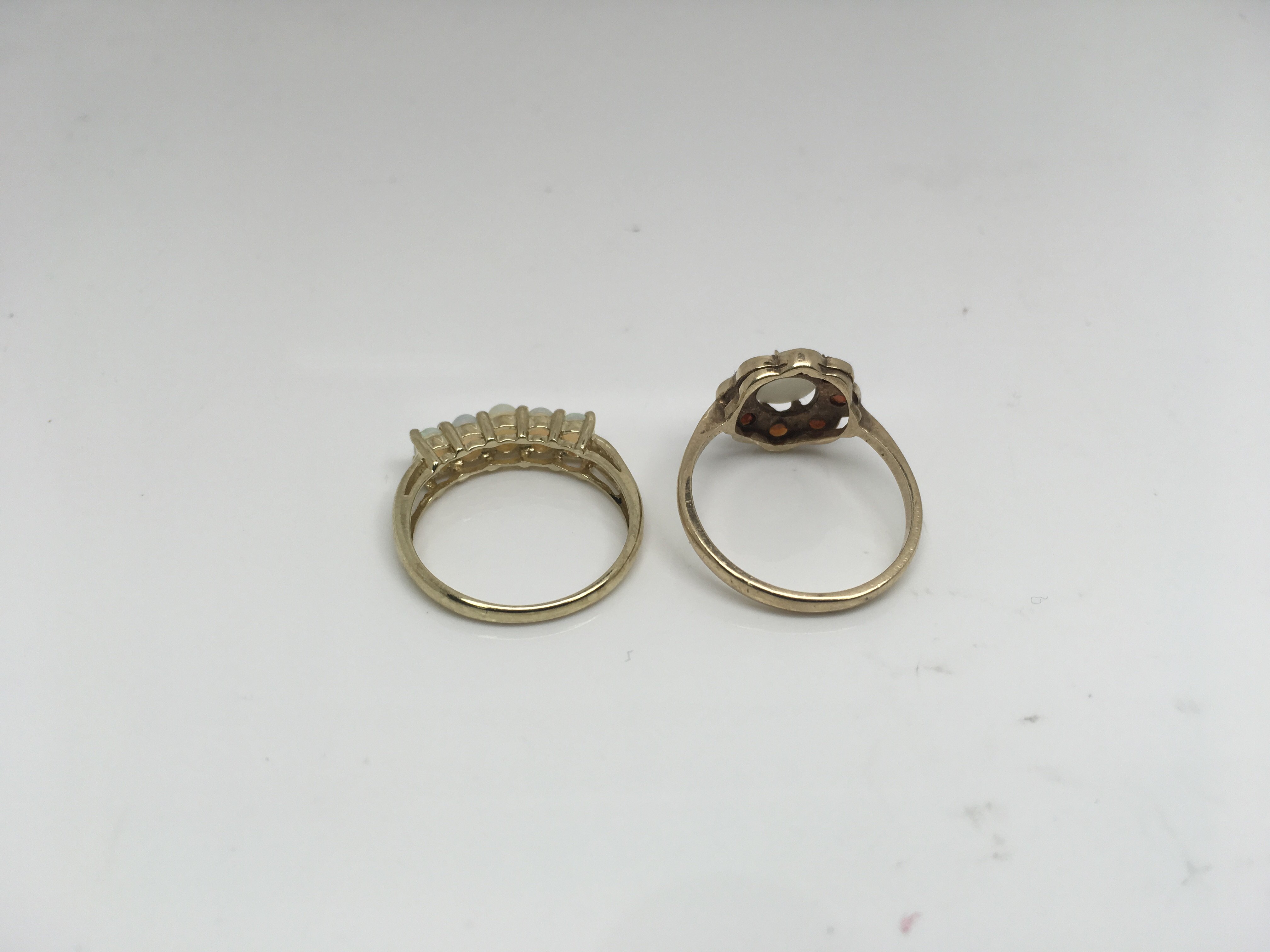 Two 9ct gold rings set with opals and garnets. Weight approx 3.94g Size approx O & M/N - Image 2 of 2