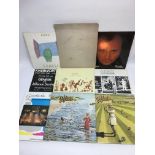 A Genesis / Phil Collins package including various LPs, a signed card by Phil Collins, Mike