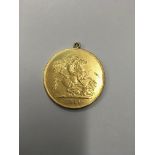 A gold coin dated 1911. Weight approx 40g