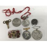 A collection of commemorative medals, an enamel Ca