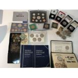 A collection of silver coins ,proof sets and other