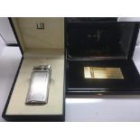 A cased Dunhill silver plated lighter and a cased