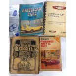 A small collection of car manuals including a Jens