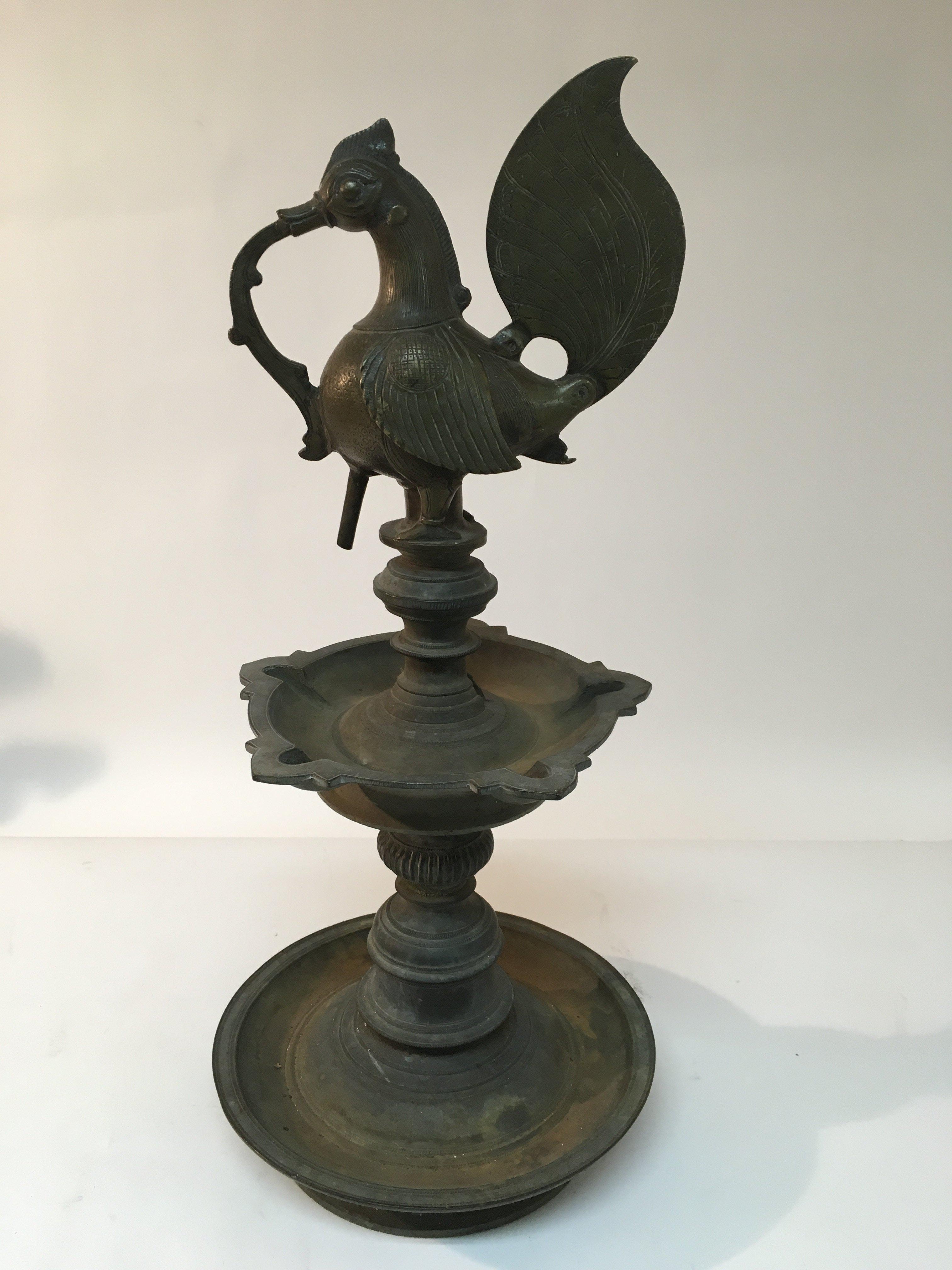 A 19th Century Hindu oil lamp, approx height 55cm.