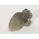 A small carved hard stone dog of Fo figure.