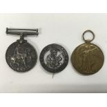 A pair of World War I medals (service and peace) w