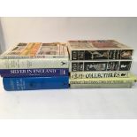 A small collection of antiques reference books.