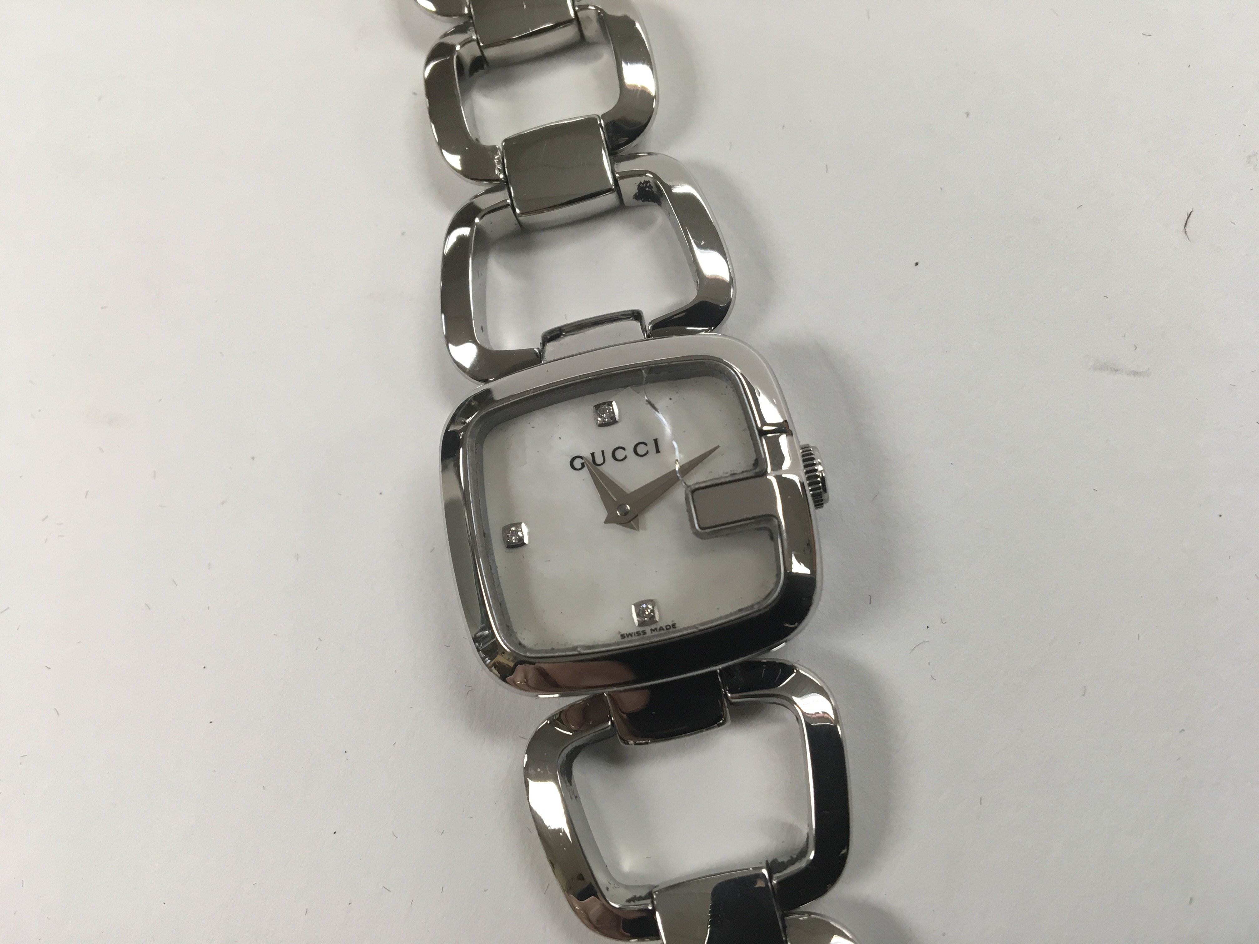 A ladies diamond dial Gucci watch. - Image 2 of 3