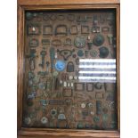 A case containing various metal detecting finds. S