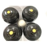 A collection of 4 Tyrolite bowling balls