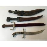 A Khukri, a Middle Eastern horn handled knife and