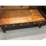 A yew wood campaign type table with inset handles.