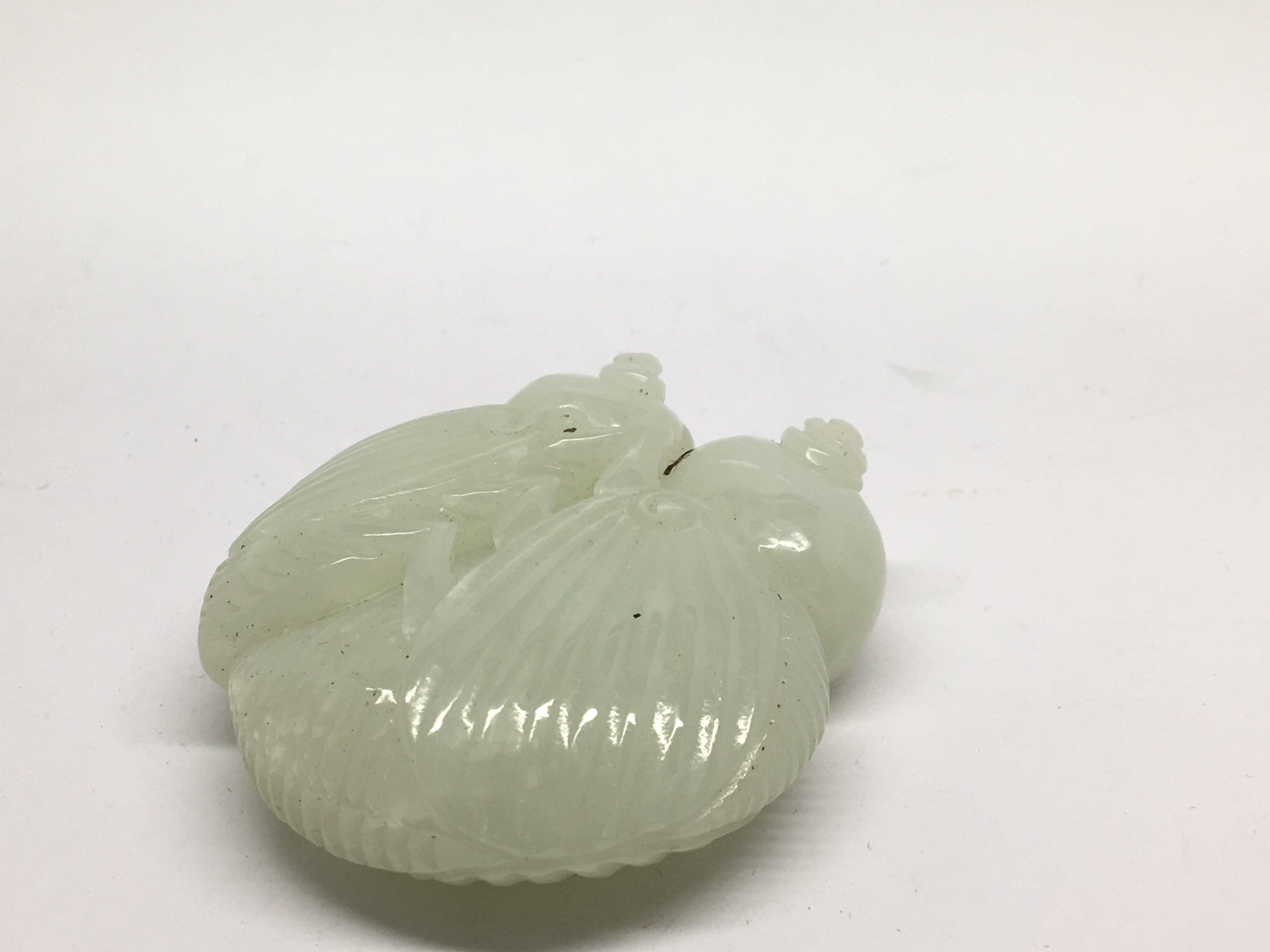 A small carved, light green jade model of a grassh - Image 3 of 3