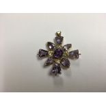 An antique gold and amethyst cross pendant / brooc