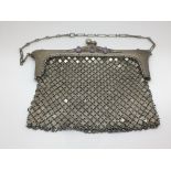 An Art Nouveau German silver purse, marked 800, se